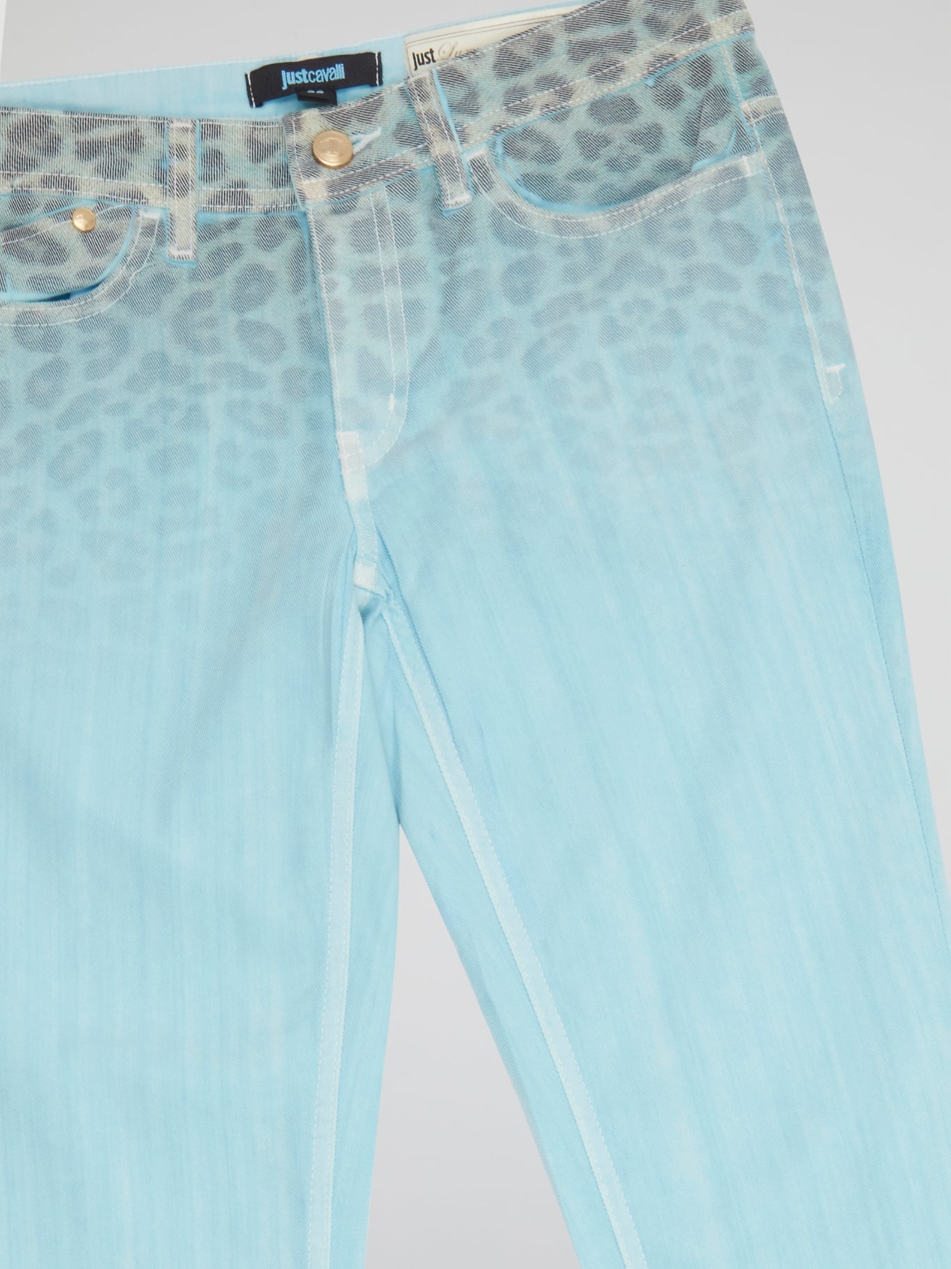 Unleash your wild side with these Blue Leopard Gradient Pants by Just Cavalli. Crafted from luxurious fabric that hugs your curves in all the right places, these pants feature a mesmerizing gradient pattern that transitions from deep indigo to fierce leopard print. Step out in style and make a statement with these bold and trendy pants that are sure to turn heads wherever you go.
