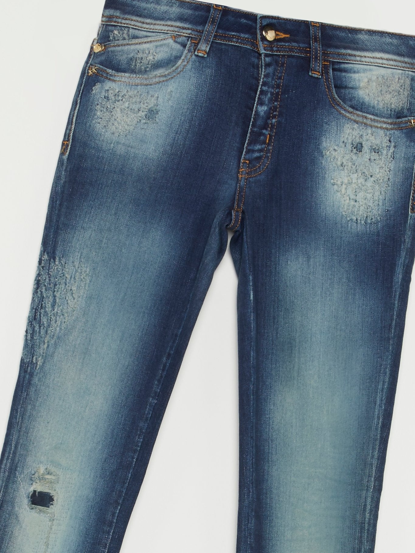 Выбеленные брюки с рваной отделкой