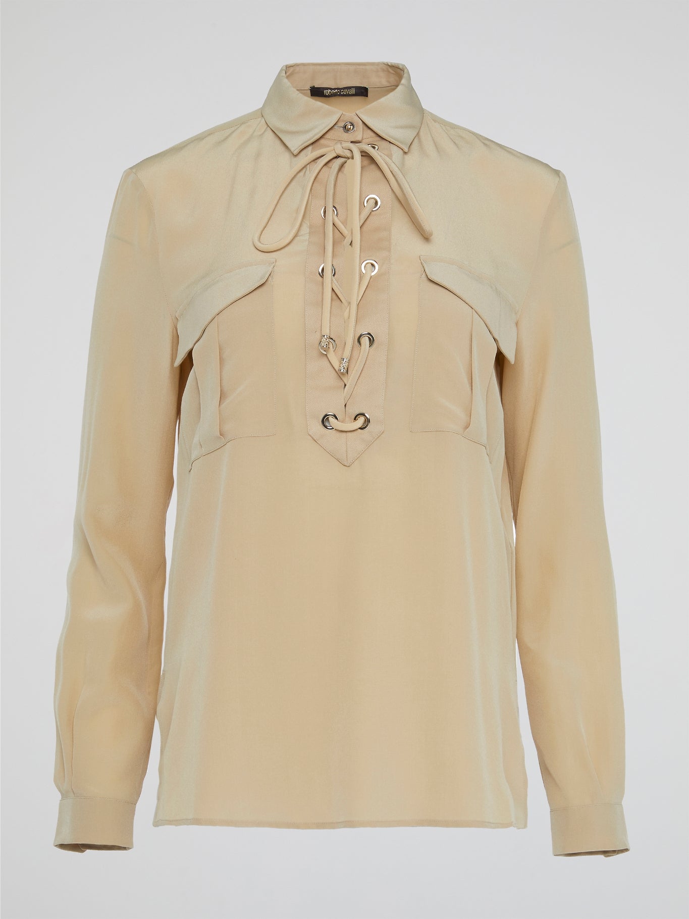 Elevate your wardrobe with the ultimate in luxury and sophistication - the Beige Lace Up Blouse by Roberto Cavalli. Crafted with exquisite attention to detail, this blouse features intricate lace detailing and a flattering silhouette that is sure to turn heads. Embrace your inner fashionista and effortlessly elevate any outfit with this chic and timeless piece.