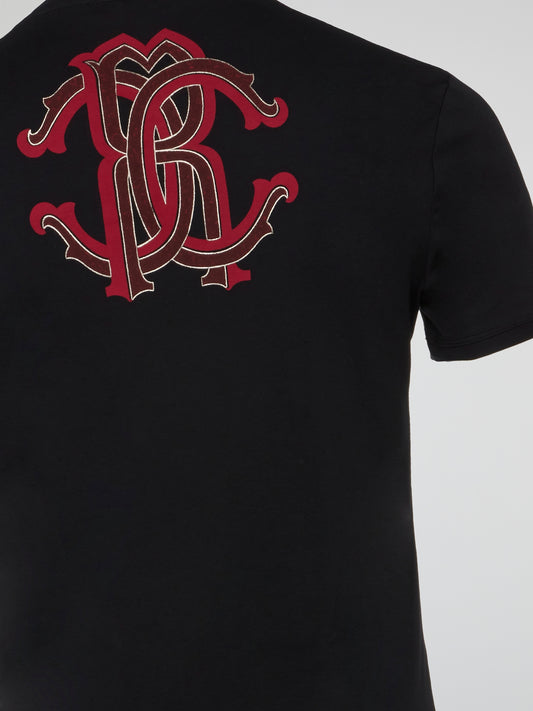 Experience the epitome of sophistication and style with our black logo print round neck t-shirt from Roberto Cavalli Underwear. Made with the finest materials and designed with meticulous attention to detail, this t-shirt is perfect for those who appreciate luxury and quality in their wardrobe. Stand out from the crowd and make a bold statement with this timeless piece that exudes confidence and elegance.