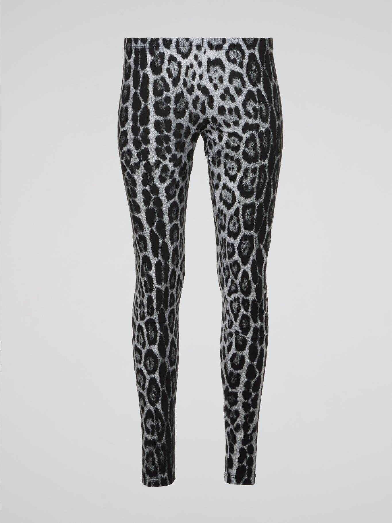 Unleash your wild side with these fierce Roberto Cavalli leopard print leggings that will add a touch of luxury to your everyday wardrobe. Made with high-quality materials and expert craftsmanship, these statement leggings are a must-have for trendsetters and fashion enthusiasts alike. Whether you're running errands or hitting the gym, stand out from the crowd and show off your unique style with these eye-catching leggings.