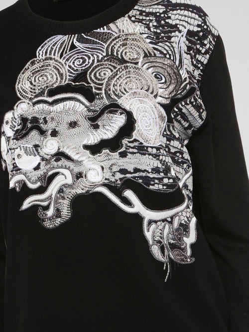 Feel effortlessly stylish and cozy in this Roberto Cavalli Black Embroidered Sweatshirt. The intricate embroidery adds a touch of elegance to this classic wardrobe staple, perfect for both casual outings and relaxing at home. Embrace your individuality and stand out from the crowd with this luxurious sweatshirt.