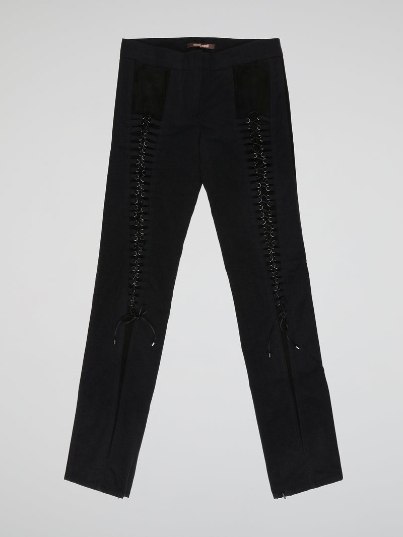 Step into elegance with these stunning Black Embellished Trousers by Roberto Cavalli. Crafted with meticulous care, each detail on these trousers tells a story of sophistication and luxury. From the delicate beaded embellishments to the figure-flattering silhouette, these trousers are a fashion statement that exudes confidence and style.