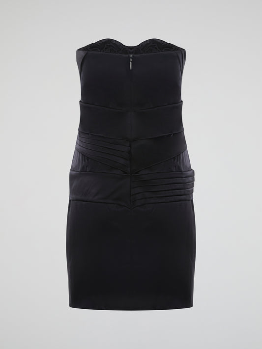 Step into the spotlight with the alluring Black Sleeveless Mini Dress by Roberto Cavalli. This exquisitely crafted piece embraces your curves and radiates elegance with its sleek silhouette and plunging neckline. Perfect for cocktail parties or a night out, this dress encapsulates the essence of sophistication and sensuality.