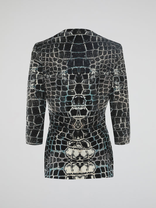 Unleash your wild side with the mesmerizing Snake Print 3/4 Sleeve Top by Roberto Cavalli. Crafted with impeccable taste and attention to detail, this statement piece effortlessly merges timeless elegance with a touch of untamed allure. Embolden your wardrobe with this fierce and versatile top that will have heads turning wherever you go.