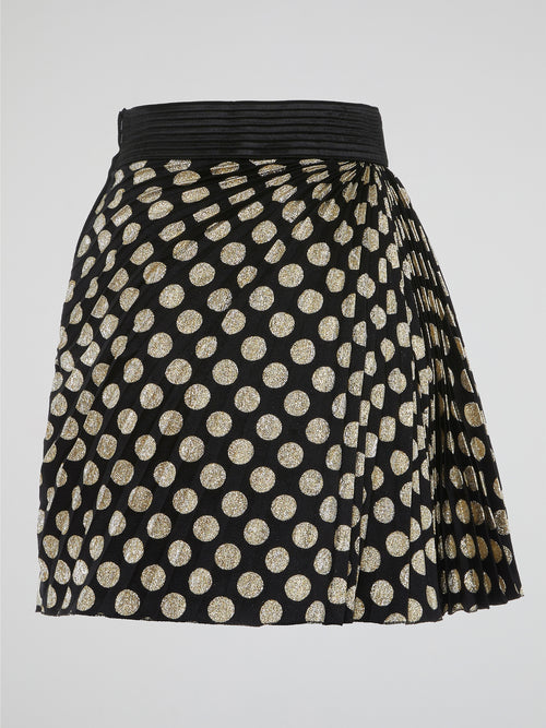 Turn up the charm with the Emanuel Ungaro Foil Polka Dot Pleated Skirt! Designed to make heads turn, this playful skirt features shimmering foil polka dots that bring a touch of whimsy to any outfit. Its flattering pleated design adds movement and dimension, while the high-quality craftsmanship ensures a luxurious feel that will make you the center of attention wherever you go.