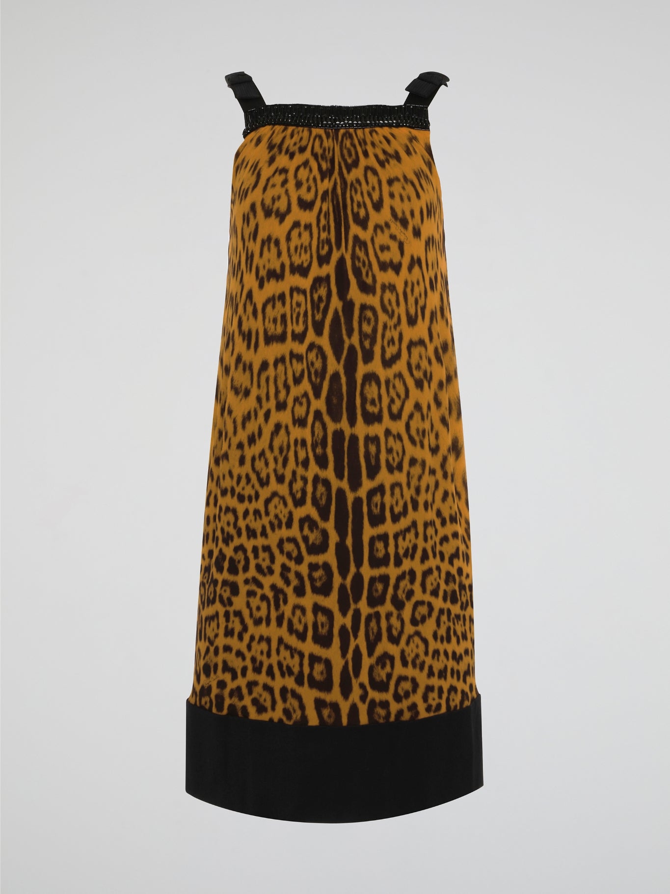 Step out in fierce style with our Brown Leopard Print Shift Dress by Roberto Cavalli. This stunning piece features a bold leopard print design in rich shades of brown, guaranteed to turn heads wherever you go. Made with high-quality materials and expert craftsmanship, this dress is the perfect choice for making a statement at any event.