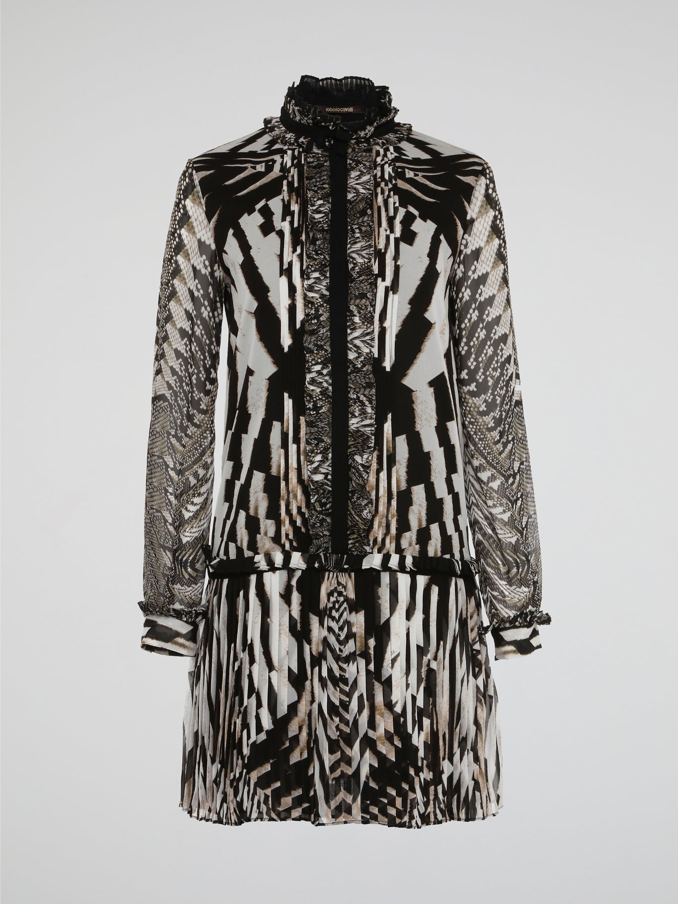 Step into the wild side of fashion with the Animal Print Pleated Shirt Dress by Roberto Cavalli. Designed to turn heads, this dress features a striking animal print pattern and flirty pleated skirt. This statement piece is perfect for those who dare to stand out and embrace their fierce style.