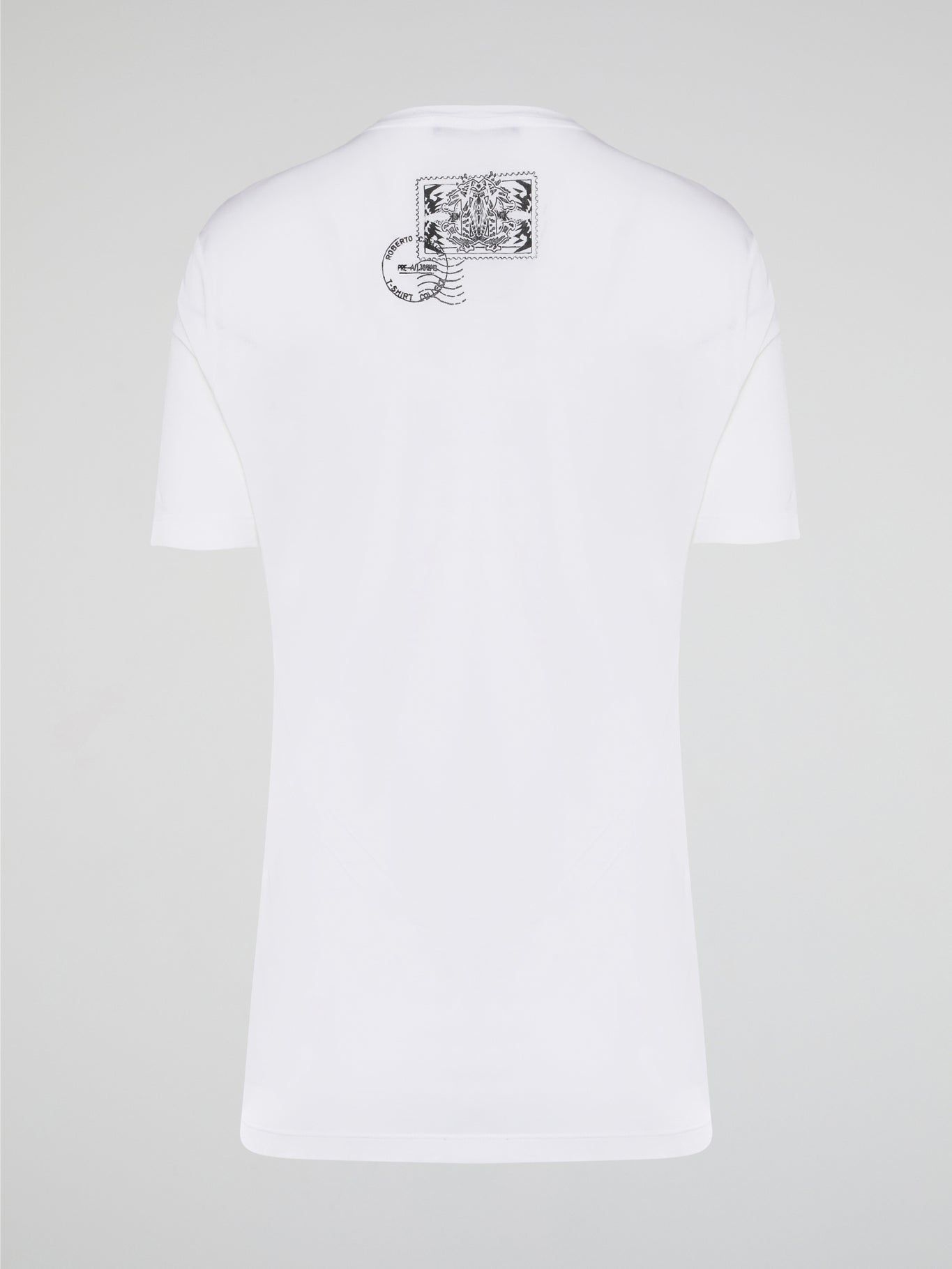 Elevate your casual style with the White Printed Oversized T-Shirt from Roberto Cavalli. Made with premium cotton fabric, this tee features a bold and eye-catching print that will set you apart from the crowd. Whether you dress it up with heels or keep it cool with sneakers, this statement piece is a must-have for your wardrobe.