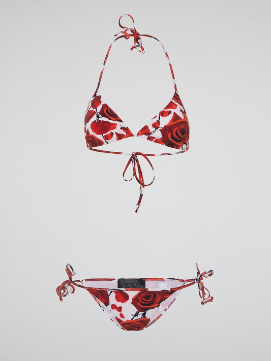 Dive into luxury with our Red Rose Print Swimwear by Philipp Plein. This eye-catching design features bold red roses on a sleek black background, perfect for making a statement poolside or at the beach. Embrace your inner glamour goddess and stand out in this stunning swimwear piece.