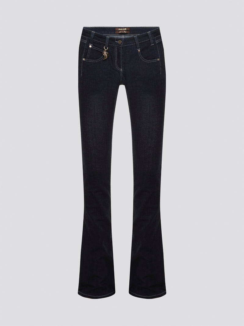 Step out in style with these Roberto Cavalli Black Contrast Stitch Flared Jeans, a modern twist on a classic silhouette. The contrast stitching adds a touch of edge to these sleek black jeans, making them a wardrobe staple for any fashion-forward individual. Pair them with a simple white t-shirt and heels for a chic and sophisticated look that will turn heads wherever you go.