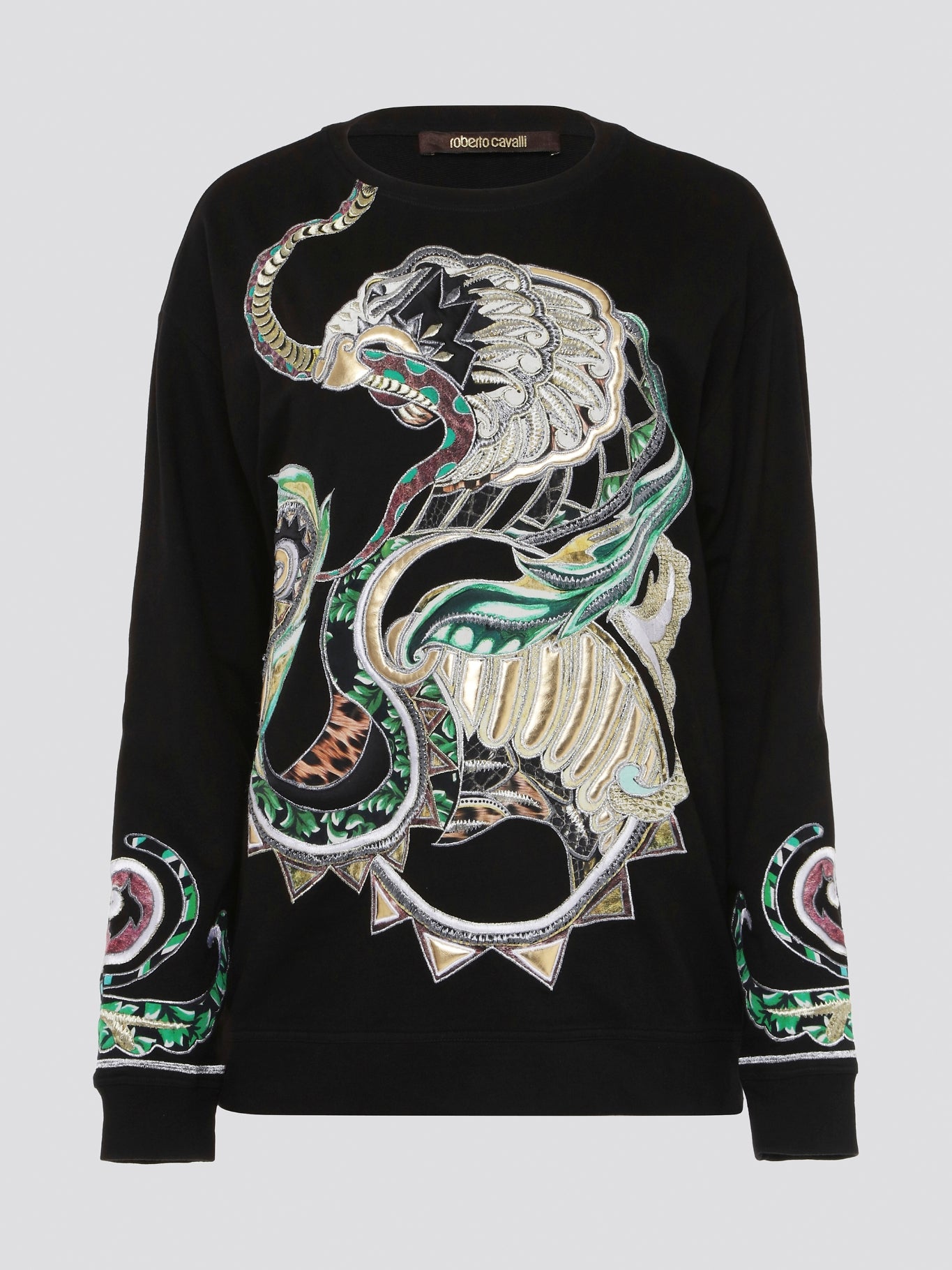 Step out in style and elevate your wardrobe with the Black Embroidered Sweatshirt from Roberto Cavalli. Featuring intricate details and luxurious craftsmanship, this sweatshirt effortlessly blends edgy street style with high-end sophistication. Make a statement and turn heads wherever you go with this must-have piece in your collection.