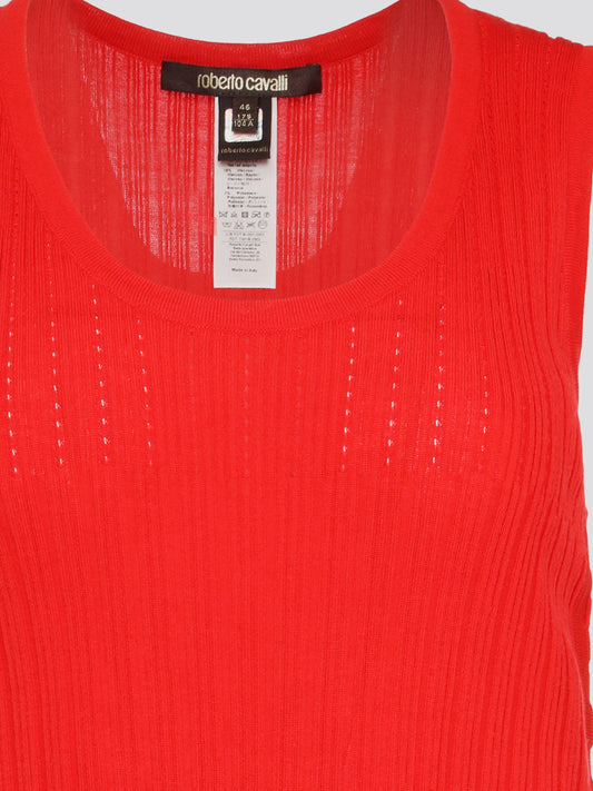 Add a pop of vibrant color to your wardrobe with our stunning Red Sleeveless Knitted Top by Roberto Cavalli. This striking top features a luxurious knit design that hugs your curves in all the right places, making it both comfortable and flattering. Whether you're heading to a stylish brunch or a night out on the town, this top is sure to turn heads and make a bold fashion statement.