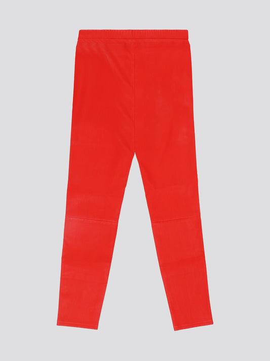 Step out in bold style with these stunning Red Elasticated Waist Trousers from Roberto Cavalli. The vibrant red hue is sure to turn heads, while the elasticated waist ensures a comfortable and flattering fit. Perfect for adding a pop of color to your wardrobe and making a statement wherever you go.