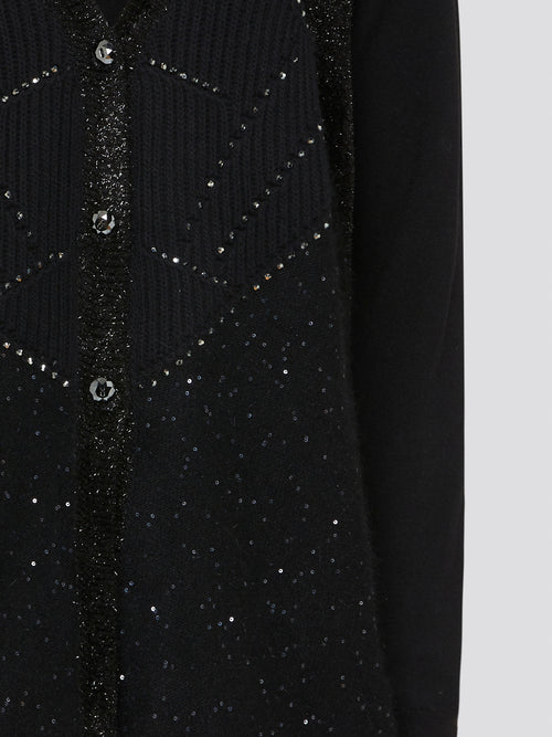Unleash your inner rockstar with the Black Studded Cardigan V.d.p. Club, the perfect blend of edgy and chic. Made from high-quality materials with intricate studded detailing, this cardigan is a statement piece that will elevate any outfit. Whether you're heading to a concert or a night out with friends, this cardigan will have you turning heads wherever you go.
