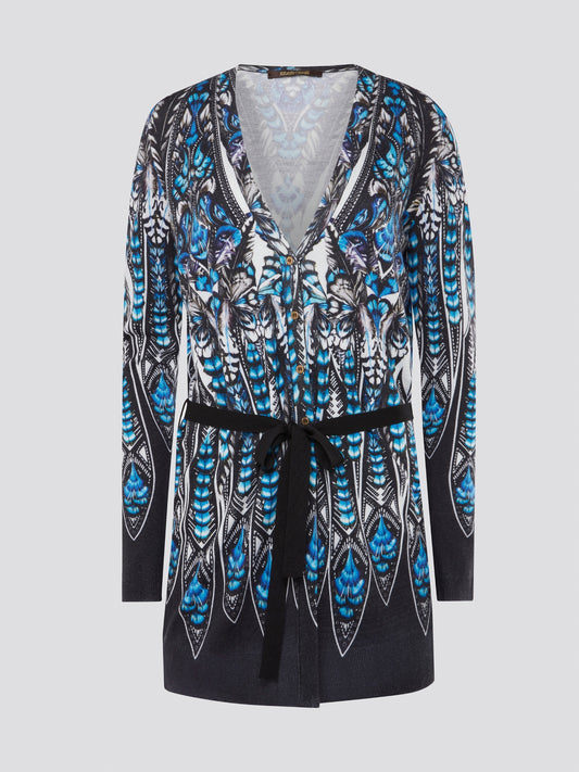 Step out in style with the Roberto Cavalli Printed Tie-Front Cardigan - a chic and sophisticated addition to any outfit. The luxurious fabric and intricate print combine to create a truly eye-catching piece that will effortlessly elevate your wardrobe. Whether paired with jeans for a casual look or layered over a dress for a night out, this cardigan is sure to become a staple in your closet.
