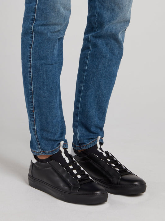 Черные низкие кроссовки с логотипом на заднике