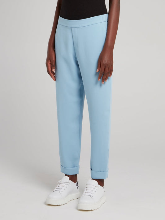 Светло-голубые спортивные брюки на резинке
