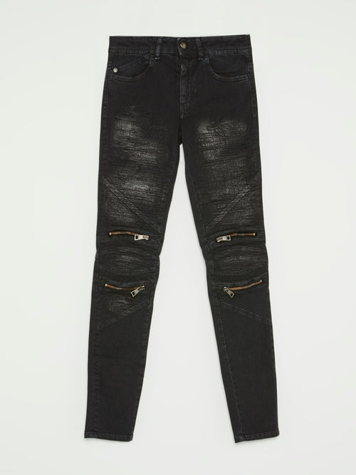 Черные джинсы с молниями на коленях