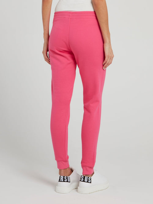 Розовые брюки из флиса с логотипом